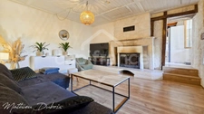 Renovated stone house with vineyard views, in the heart of a charming village