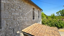 Renovated stone house with vineyard views, in the heart of a charming village