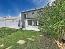 Maison de 165m2 entièrement rénovée avec jardin, garage