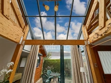Saint-Genis-Pouilly, Pregnin - Exclusive listing - Architect-designed house - Full-height veranda - 220m² of living space - Rental income (1-bedroom apartment: 48m²) - Garage - Carport - 3 terraces - 