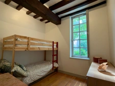 Elegant 2-bedroom apartment with private paved courtyard and secure parking.