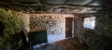 2-bedroom house (82m²) with a 300m² barn to renovate