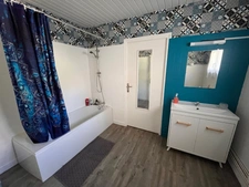Maison familiale atypique avec grand garage attenant