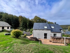  Maison familiale de 120 m² avec sous-sol complet, terrasse et jardin arboré