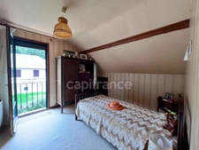 Maison familiale de 120 m² avec sous-sol complet, terrasse et jardin arboré