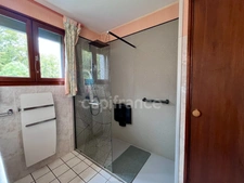  Maison familiale de 120 m² avec sous-sol complet, terrasse et jardin arboré
