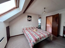  Maison familiale de 120 m² avec sous-sol complet, terrasse et jardin arboré