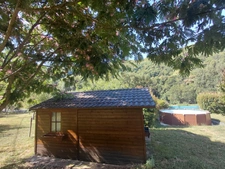 House on the edge of the lot with river access