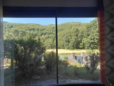 House on the edge of the lot with river access
