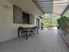 House on the edge of the lot with river access