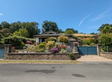 House on the edge of the lot with river access