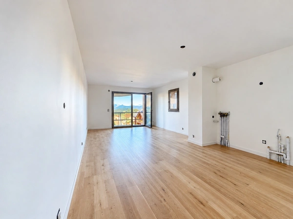 Appartement T3 avec grand jardin, cave et parking LES CARROZ D'ARACHES (74)