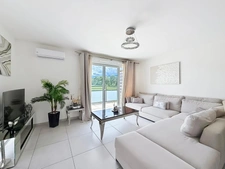 Joli Appartement T4 récent avec balcon, garage double et climatisation – ORNEX (01)