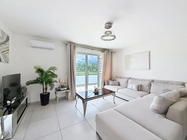 Joli Appartement T4 récent avec balcon, garage double et climatisation – ORNEX (01)