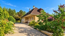 Maison familiale 148 m² – 5 chambres, grand sous-sol et terrain de 2 566 m² – Saint-Martial-de-Nabirat