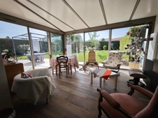 CHOLET Pavillon 4 chambres avec charpente apparente, sous-sol total et véranda récente