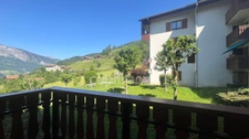 A vendre : Appartement 2 pièces de 36m2 avec balcon et cave dans un cadre d'exception en plein coeur de MANIGOD (74) - Vue montagnes