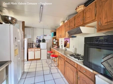 Maison à vendre 6 pièces GERZAT (63) Centre-ville Maison familiale de caractère de 145 m² avec terrasse, toit-terrasse, cuisine d'été, garage et cave voûtée