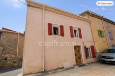 VILLESPASSANS (34) -Un petit prix, un beau potentiel et des charges maîtrisées ! Cette maison de village de 58 m², climatisée, avec 2 chambres et une taxe foncière de seulement 280 €, est idéale pour 
