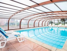 "Duplex à Béziers de 36 m² au sol avec jardin de 80 m² et terrasse de 12 m², dans une résidence calme et sécurisée avec piscines, parfait pour résidence secondaire ou location saisonnière."