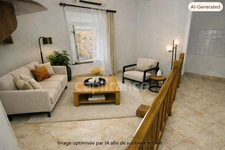 VILLESPASSANS (34) -Un petit prix, un beau potentiel et des charges maîtrisées ! Cette maison de village de 58 m², climatisée, avec 2 chambres et une taxe foncière de seulement 280 €, est idéale pour 