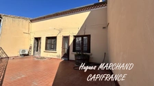 LESPIGNAN - Maison de village avec jardin et grand garage – Fort potentiel !