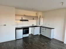 Appartement récent de type 2 avec balcon et parking à Carquefou.