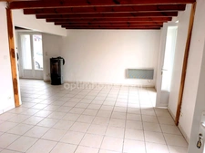 Maison de ville rénovée de 100 m² avec jardin de 600 m² et dépendance