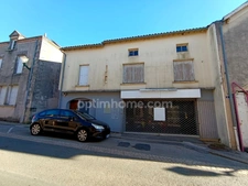 ENSEMBLE IMMOBILIER À FORT POTENTIEL – HABITATION, LOCAUX ET POSSIBILITÉ DE CRÉER UN SECOND LOGEMENT