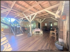 A VENDRE A KOUROU UNE CHARMANTE MAISON T5 EN BOIS DE 133 m² SUPERFICIE TERRAIN 2 HECTARES - AU PRIX DE 346 500 €.
