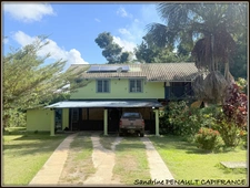 A VENDRE A KOUROU UNE CHARMANTE MAISON T5 EN BOIS DE 133 m² SUPERFICIE TERRAIN 2 HECTARES - AU PRIX DE 346 500 €.