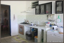 A VENDRE A KOUROU (GUYANE FRANCAISE) UNE CHARMANTE PROPRIETE DE 486 m² - DEUX APPARTEMENTS T3 - UN STUDIO - SUPERFICIE DU TERRAIN DE 5000 m² - AU PRIX DE 427000 €.