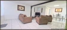 A VENDRE A KOUROU UN MAGNIFIQUE COMPLEXE IMMOBILIER DE 8 APPARTEMENTS (R+1) DE 960 m² - UNE VILLA T5 (R+1) DE 310 m² - TERRAIN 1870 m² - AU PRIX DE 1 755 000 €.