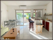 A VENDRE A KOUROU (97310) UNE MAGNIFIQUE MAISON EN BOIS T5 de 106 m² AVEC 2 MAISONS T2 INDEPENDANTES - TERRAIN DE 775 m² - AU PRIX DE 407 000 €.  