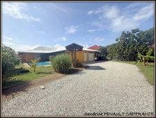 A VENDRE A KOUROU (97310) UNE MAGNIFIQUE VILLA D'ARCHITECTE T5 DE 135 m² - TERRAIN DE 876 m² - AU PRIX DE 486000€.