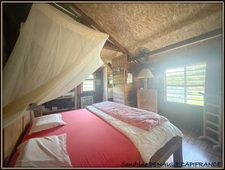 A VENDRE A KOUROU UNE CHARMANTE MAISON T5 EN BOIS DE 133 m² SUPERFICIE TERRAIN 2 HECTARES - AU PRIX DE 346 500 €.
