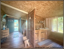 A VENDRE A KOUROU UNE CHARMANTE MAISON T5 EN BOIS DE 133 m² SUPERFICIE TERRAIN 2 HECTARES - AU PRIX DE 346 500 €.