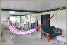A VENDRE A KOUROU (GUYANE FRANCAISE) UNE CHARMANTE PROPRIETE DE 486 m² - DEUX APPARTEMENTS T3 - UN STUDIO - SUPERFICIE DU TERRAIN DE 5000 m² - AU PRIX DE 427000 €.