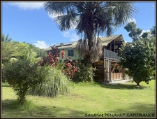 A VENDRE A KOUROU UNE CHARMANTE MAISON T5 EN BOIS DE 133 m² SUPERFICIE TERRAIN 2 HECTARES - AU PRIX DE 346 500 €.
