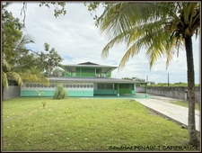 A VENDRE A KOUROU (GUYANE FRANCAISE) UNE CHARMANTE PROPRIETE DE 486 m² - DEUX APPARTEMENTS T3 - UN STUDIO - SUPERFICIE DU TERRAIN DE 5000 m² - AU PRIX DE 427000 €.
