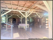 A VENDRE A KOUROU UNE CHARMANTE MAISON T5 EN BOIS DE 133 m² SUPERFICIE TERRAIN 2 HECTARES - AU PRIX DE 346 500 €.