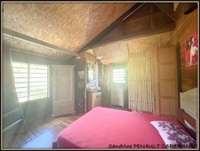 A VENDRE A KOUROU UNE CHARMANTE MAISON T5 EN BOIS DE 133 m² SUPERFICIE TERRAIN 2 HECTARES - AU PRIX DE 346 500 €.