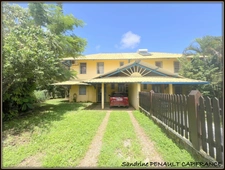 A VENDRE A KOUROU (GUYANE FRANCAISE) UNE JOLIE MAISON JUMELEE T5 (R+1) de 103 m² - SUPERFICIE DU TERRAIN 299 m² AU PRIX DE 185 000 €.