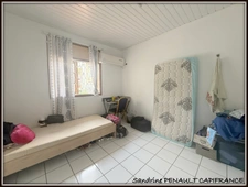 A VENDRE A CAYENNE UN IMMEUBLE DE RAPPORT DE 167 m² - 1 LOCAL DE 98 m² - 1 APPARTEMENT T3 DE 51 m² - 1 STUDIO DE 18 m² - AU PRIX DE 306 000 €.