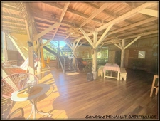 A VENDRE A KOUROU UNE CHARMANTE MAISON T5 EN BOIS DE 133 m² SUPERFICIE TERRAIN 2 HECTARES - AU PRIX DE 346 500 €.