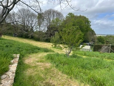 CHARMANTE LONGERE 200 m² BOURG DE GRAND-CHAMP (56)