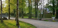 PROPRIETE RENOVEE CAMPAGNE CHIC AVEC PISCINE, DEPENDANCES ET PARC ARBORE CLOS   A BRECH (56)