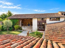 RIEUMES – maison T8 de 208 m², 200 m² de dépendances, combles aménageables de 90 m² et terrain de 1 500 m² – DPE C