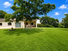 Maison de plain-pied 160 m² – 4 chambres, bureau, terrain arboré de 2 500 m²
