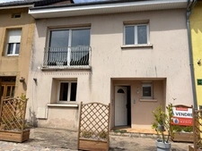 Maison de type appartement avec balcon 